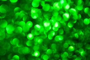 Green lights abstract bokeh backdrop. Chrismas lights bokeh. photo