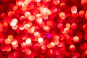 Red lights abstract bokeh backdrop. Chrismas or valentine's day lights bokeh. photo