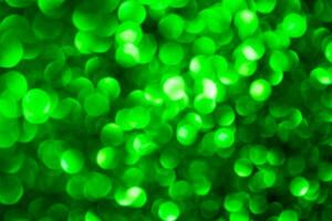 Green lights abstract bokeh backdrop. Chrismas lights bokeh. photo