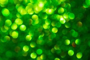 Green lights abstract bokeh backdrop. Chrismas lights bokeh. photo