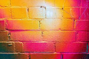 A fragment of colorful graffiti painted on a brick wall. Abstract backdrop for design. photo