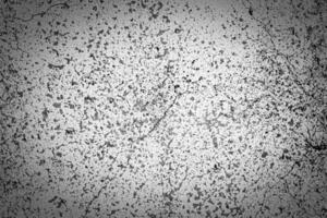 Gray concrete texture with vignette. Abstract grunge background with copy space. photo