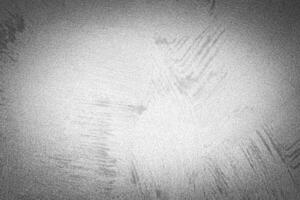Gray decorative plaster texture with vignette. Abstract grunge background with copy space. photo