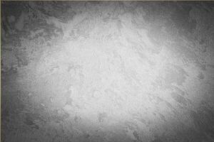 Gray decorative plaster texture with vignette. Abstract grunge background with copy space. photo