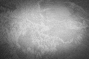 Gray decorative plaster texture with vignette. Abstract grunge background with copy space. photo