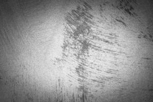 Gray decorative plaster texture with vignette. Abstract grunge background with copy space. photo
