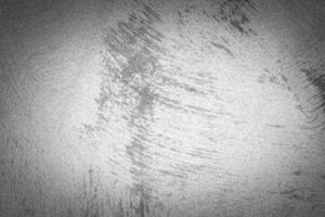 Gray decorative plaster texture with vignette. Abstract grunge background with copy space. photo