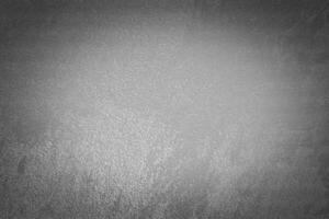 Gray decorative plaster texture with vignette. Abstract grunge background with copy space. photo