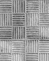 Top view on paving stone road. Old pavement of concrete texture. Cobblestone sidewalk. Black and white abstract background for design. photo
