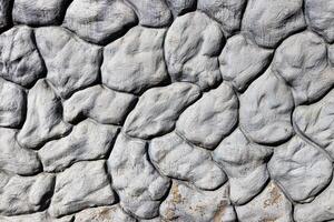 Black and white texture of a wall made of stones. Abstract background. photo