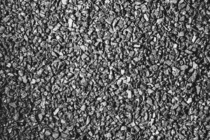 Close-up activated carbon texture. Coconut charcoal. photo