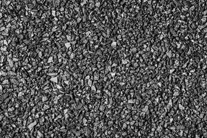 Close-up activated carbon texture. Coconut charcoal. photo