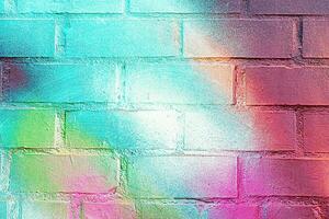 A fragment of colorful graffiti painted on a wall. Abstract urban background. photo