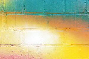 A fragment of colorful graffiti painted on a wall. Abstract urban background. photo
