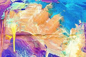 A fragment of colorful graffiti painted on a wall. Abstract urban background. photo