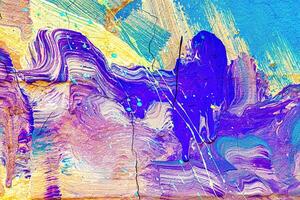 A fragment of colorful graffiti painted on a wall. Abstract urban background. photo