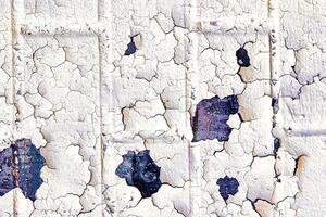 A fragment of colorful graffiti painted on a wall. Abstract urban background. photo