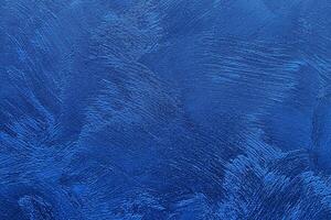 Texture of blue decorative plaster or concrete. Abstract grunge background. photo