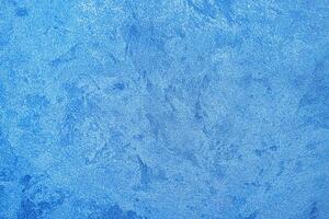 Texture of blue decorative plaster or concrete. Abstract grunge background. photo