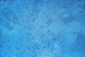 Texture of blue decorative plaster or concrete. Abstract grunge background. photo