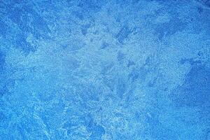 Texture of blue decorative plaster or concrete. Abstract grunge background. photo