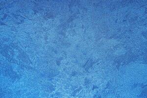 Texture of blue decorative plaster or concrete. Abstract grunge background. photo