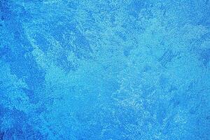Texture of blue decorative plaster or concrete. Abstract grunge background. photo