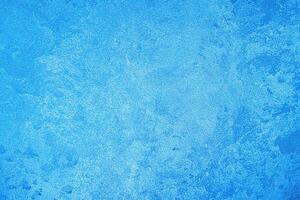 Texture of blue decorative plaster or concrete. Abstract grunge background. photo