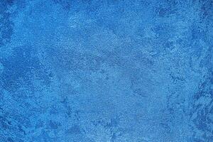 Texture of blue decorative plaster or concrete. Abstract grunge background. photo