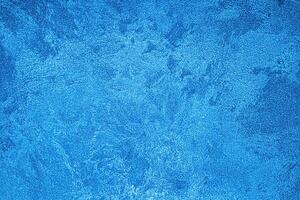 Texture of blue decorative plaster or concrete. Abstract grunge background. photo