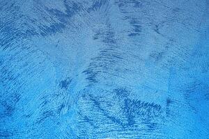 Texture of blue decorative plaster or concrete. Abstract grunge background. photo