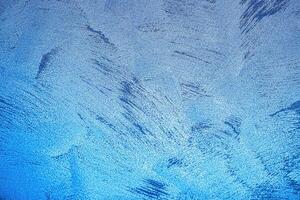 Texture of blue decorative plaster or concrete. Abstract grunge background. photo