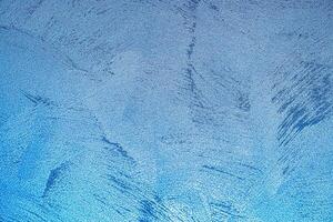 Texture of blue decorative plaster or concrete. Abstract grunge background. photo