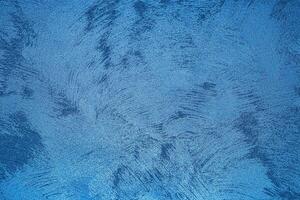 Texture of blue decorative plaster or concrete. Abstract grunge background. photo