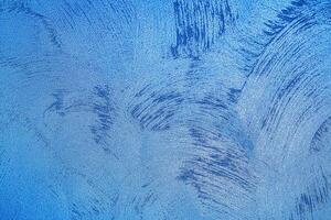 Texture of blue decorative plaster or concrete. Abstract grunge background. photo