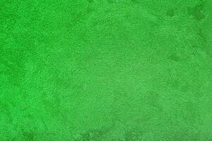 Texture of green decorative plaster or concrete. Abstract grunge background. photo