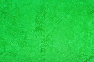 Texture of green decorative plaster or concrete. Abstract grunge background. photo