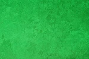 Texture of green decorative plaster or concrete. Abstract grunge background. photo