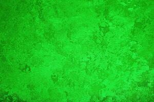 Texture of green decorative plaster or concrete. Abstract grunge background. photo