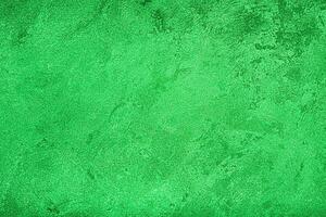 Texture of green decorative plaster or concrete. Abstract grunge background. photo