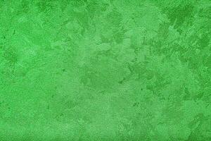 Texture of green decorative plaster or concrete. Abstract grunge background. photo