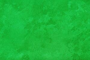 Texture of green decorative plaster or concrete. Abstract grunge background. photo