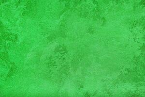 Texture of green decorative plaster or concrete. Abstract grunge background. photo