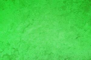 Texture of green decorative plaster or concrete. Abstract grunge background. photo