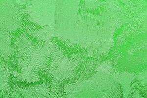 Texture of green decorative plaster or concrete. Abstract grunge background. photo