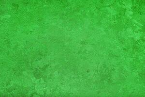 Texture of green decorative plaster or concrete. Abstract grunge background. photo