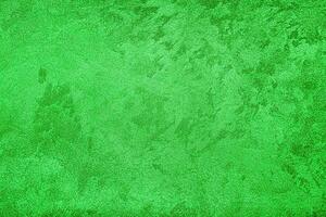 Texture of green decorative plaster or concrete. Abstract grunge background. photo