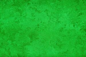 Texture of green decorative plaster or concrete. Abstract grunge background. photo