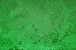 Texture of green decorative plaster or concrete. Abstract grunge background. photo