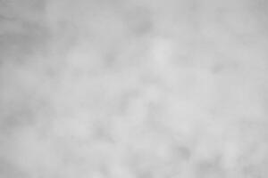 Blured gray decorative plaster or concrete. Abstract grunge background for design. photo